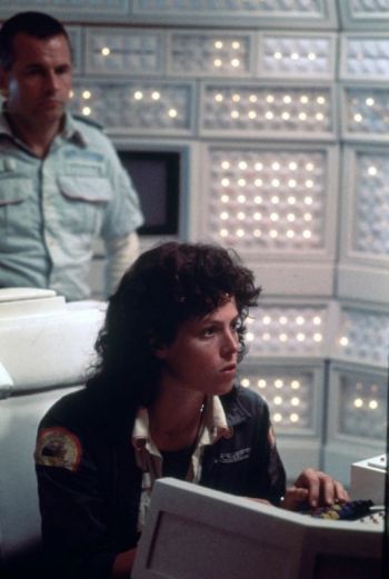 The android Ash sneaks up on Ripley within Mu-th-r's control room.